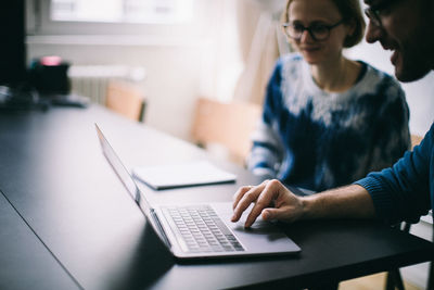 People working on laptop