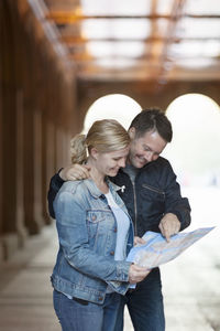 Couple reading map