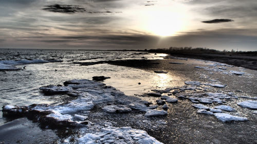 Scenic view of sea against sky during sunset