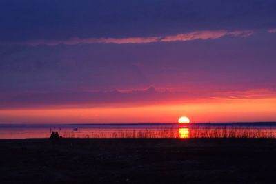 Scenic view of sea at sunset