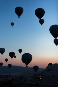 Low angle view of hot air balloons against sky