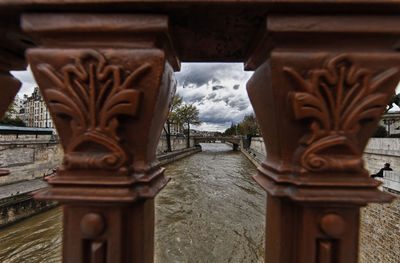 Close-up of cross on bridge