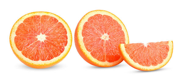 Close-up of oranges against white background