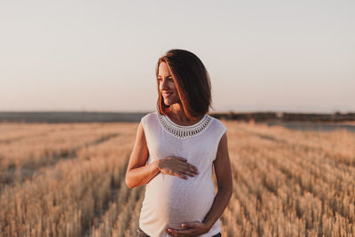 Woman standing in a field