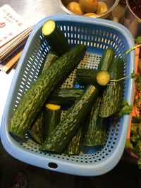 Cucumbers in basket at home