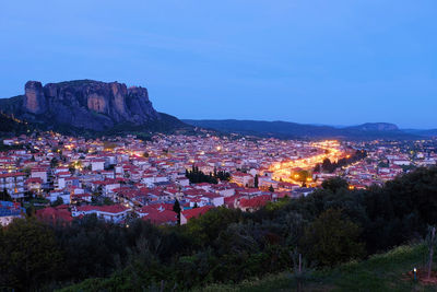 High angle view of illuminated buildings in city