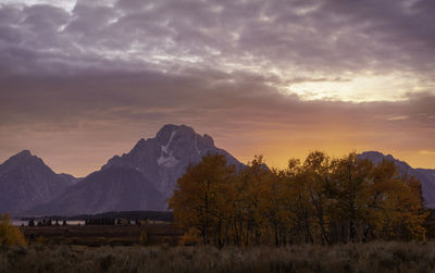 Scenic view of mountains against sky during sunset