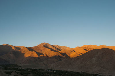 Scenic view of mountains against clear sky