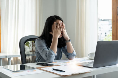 Businesswoman working at office