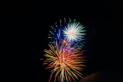Low angle view of firework display