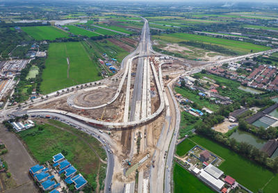 High angle view of interchange connecting city 