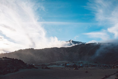 Scenic view of land against sky