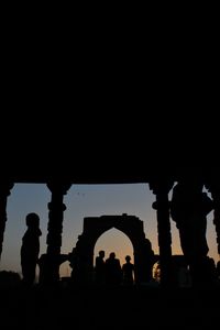 Silhouette of people at night