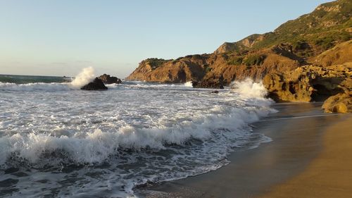 Scenic view of sea against clear sky