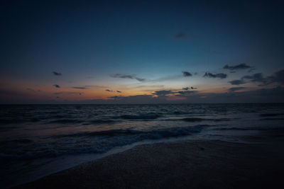 Scenic view of sea against sky at sunset