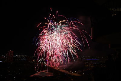 Firework display at night