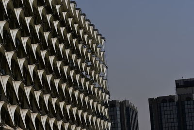 Low angle view of modern building against clear sky