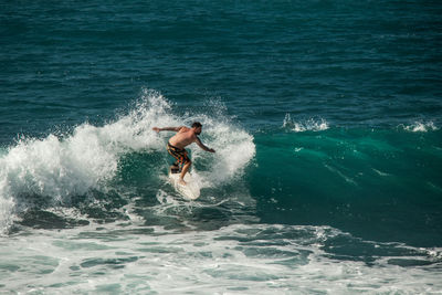 Man surfing in sea
