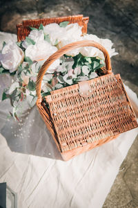 High angle view of cake in wicker basket on table