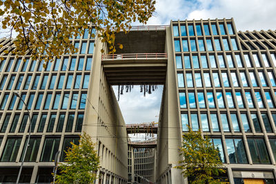 Low angle view of skyscraper against sky