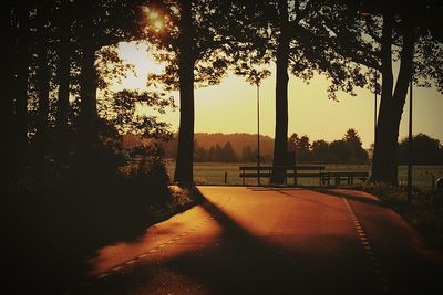 Scenic view of road at sunset