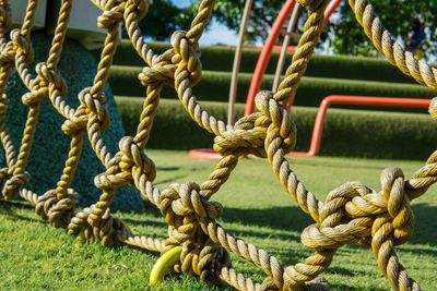 Close-up of rope tied to metal