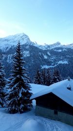 Scenic view of snow covered mountains