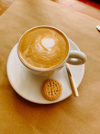 High angle view of cappuccino on table