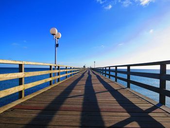 View of bridge against blue sky