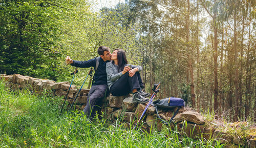 Young couple on road in forest