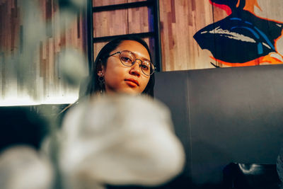 Portrait of woman looking away