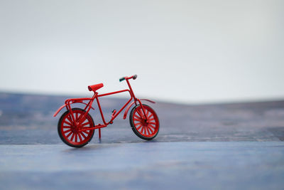 Close-up of bicycle against clear sky