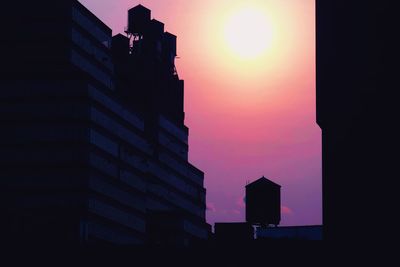 Silhouette of buildings at sunset