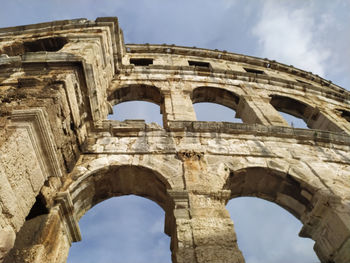 Low angle view of historical building against sky