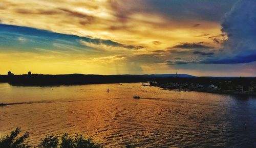 Scenic view of sea against dramatic sky