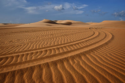 Scenic view of desert against sky