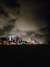 View of city lit up at night