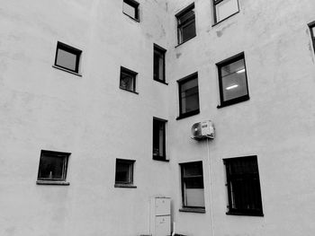 Low angle view of air conditioner on wall