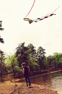 Full length of woman jumping in mid-air