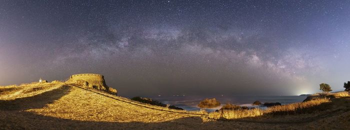 Scenic view of star field against sky at night