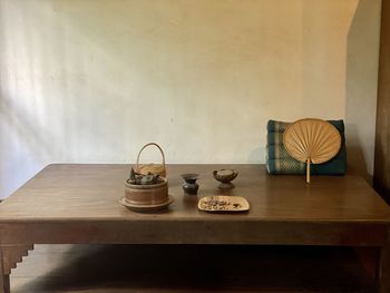 Table and people on cutting board at home