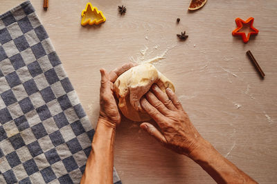 High angle view of woman preparing food on table