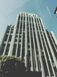 Low angle view of modern building against sky