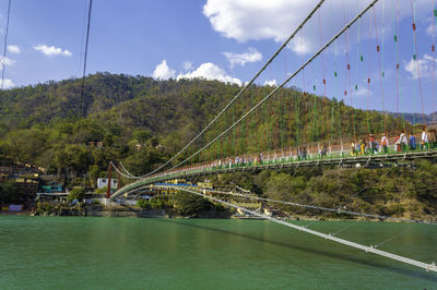 Laxman jhula bridge view with mountains and ganges river