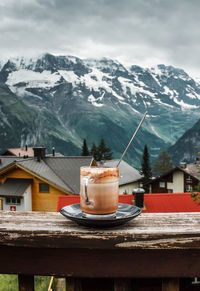 Switzerland, jungfrau. swiss alps. cozy  small village in mountains. morning hot cup of coffee.