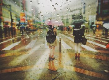 Road passing through city during rainy season