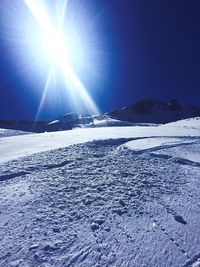 Scenic view of frozen landscape against clear sky