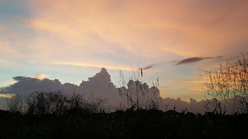 Scenic view of mountains against sky during sunset