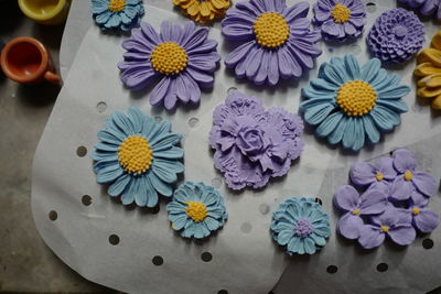 High angle view of multi colored flowers on table