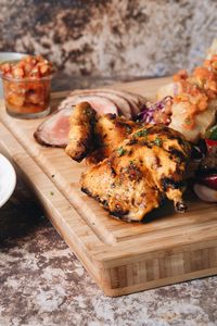 Close-up of meat on cutting board